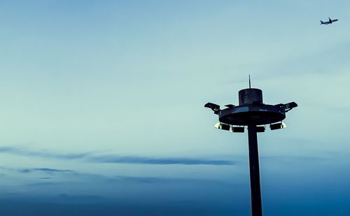 Low angle view of street light against sky