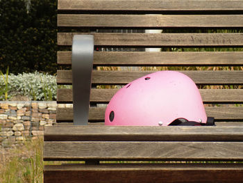 Close-up of bench on table in park