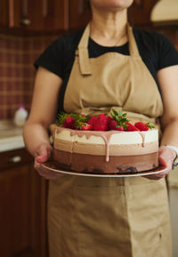 Midsection of woman having food