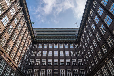 Low angle view of modern building against sky