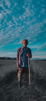 Man standing over the paddy fields