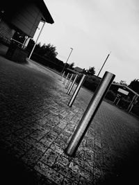 Tilt image of built structure against clear sky