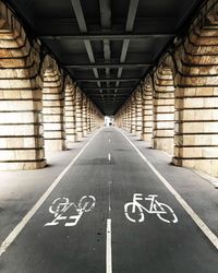 High angle view of bicycle sign on road