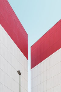 Symmetrical architecture against clear blue sky