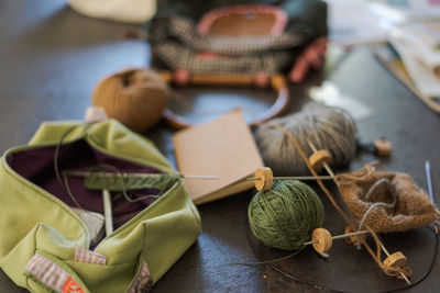 High angle view of sewing items on table