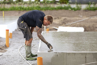 Worker preparing foundations