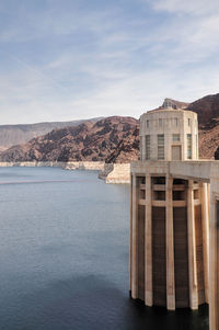 View of the pen stock towers over lake mead at hoover dam, between arizona and nevada states, usa.