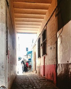 Narrow alley along buildings