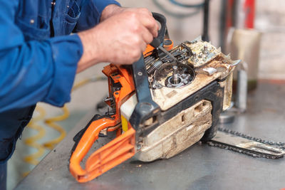 Man working on metal structure