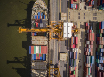 High angle view of container ship at commercial dock