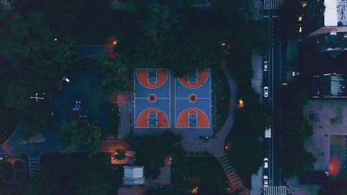 Aerial view of basketball court by road
