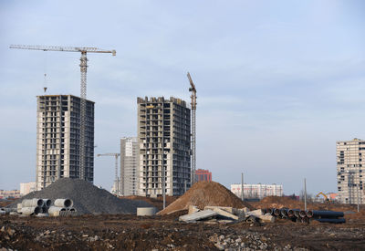 Modern buildings against sky in city