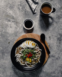 High angle view of coffee cup on table