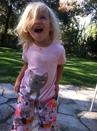 Portrait of happy girl playing in park