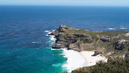 High angle view of sea shore against sky