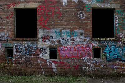 Graffiti on wall of old building