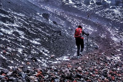 High angle view of man walking on street