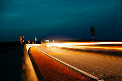 Light trails on road at night