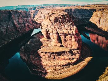 High angle view of rock formations in water