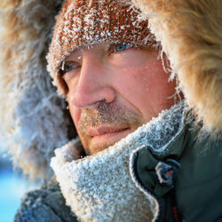 Portrait of man in snow