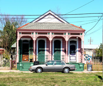 Facade of building with trees in background