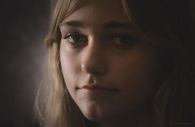 Close-up portrait of young woman