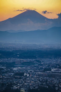 High angle view of townscape against sky during sunset