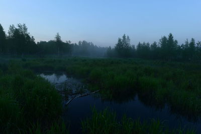 Scenic view of lake against clear sky