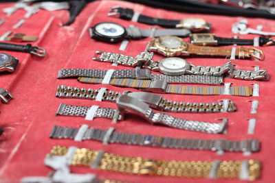 Close-up of wristwatches for sale in store