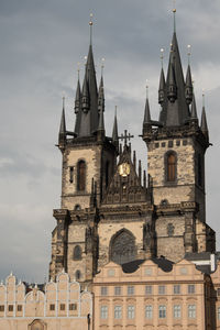 Low angle view of bell tower against sky