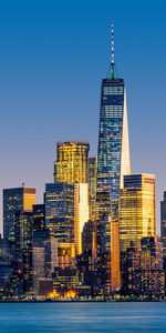 Modern buildings against sky in city