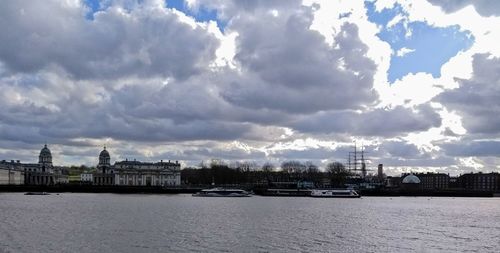 View of city against cloudy sky