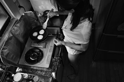 High angle view of woman holding food