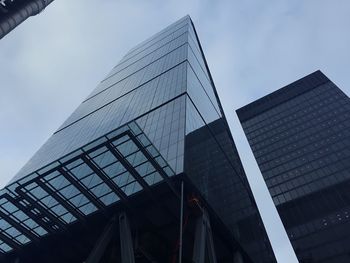 Low angle view of tall building against the sky
