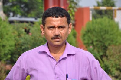 Portrait of man standing outdoors