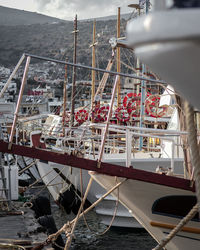 Boats moored at harbor