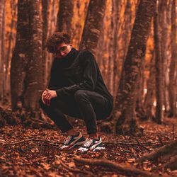 Young man in forest