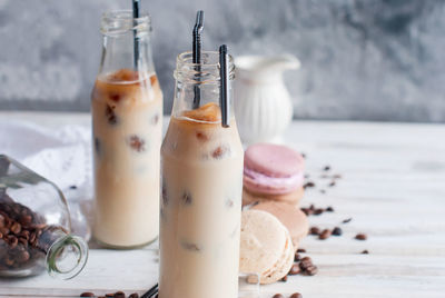 Close-up of drink in glass jar on table