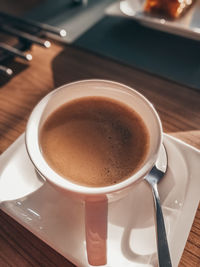 High angle view of coffee on table