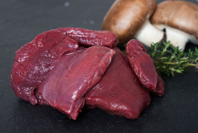 Close-up of meat on table