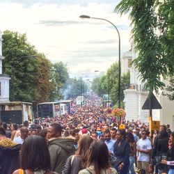 People looking at city street