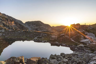 Scenic view of mountains against sky during sunset