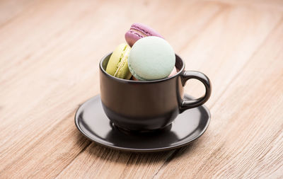 Close-up of coffee cup on table