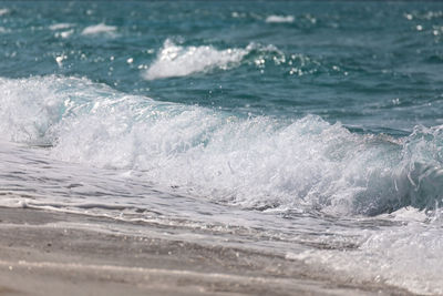 Close-up of wave splashing on shore