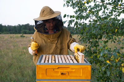 Side view of man using mobile phone