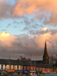 Panoramic view of city against sky during sunset