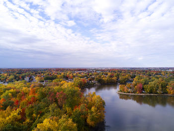 Scenic view of lake against sky during autumn