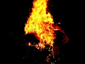 Bonfire on field at night