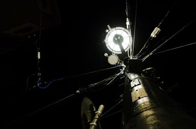 Low angle view of illuminated ferris wheel
