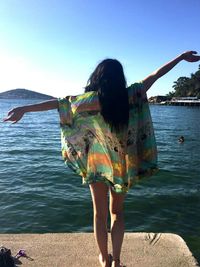 Woman standing on beach